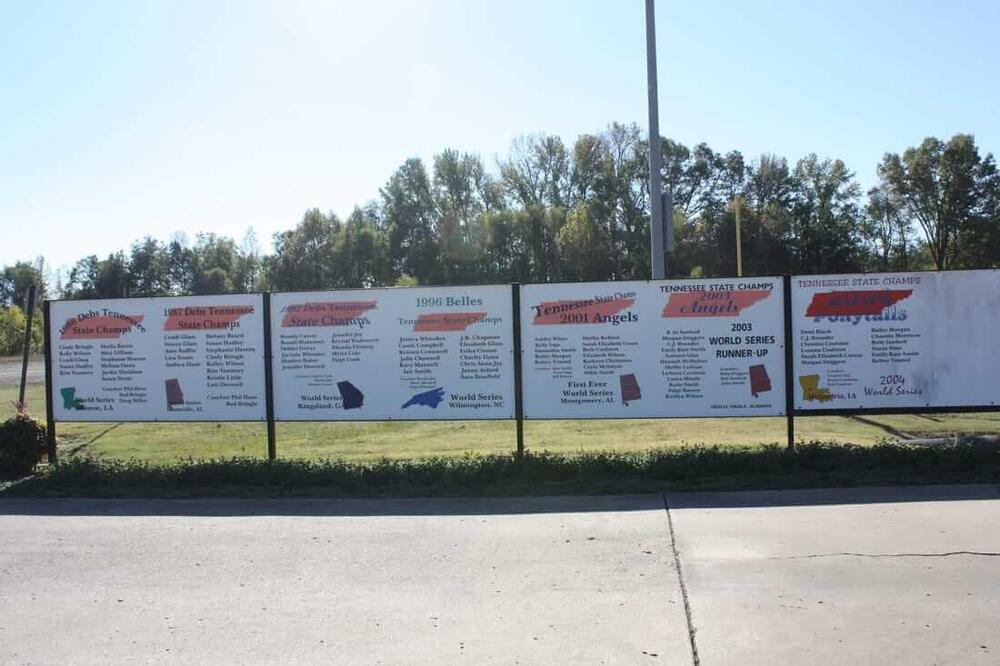 signs showing past teams that had accomplishments
