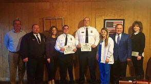 covington fire department members and community leaders pose for a photo