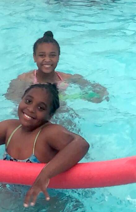 children playing in a swimming pool